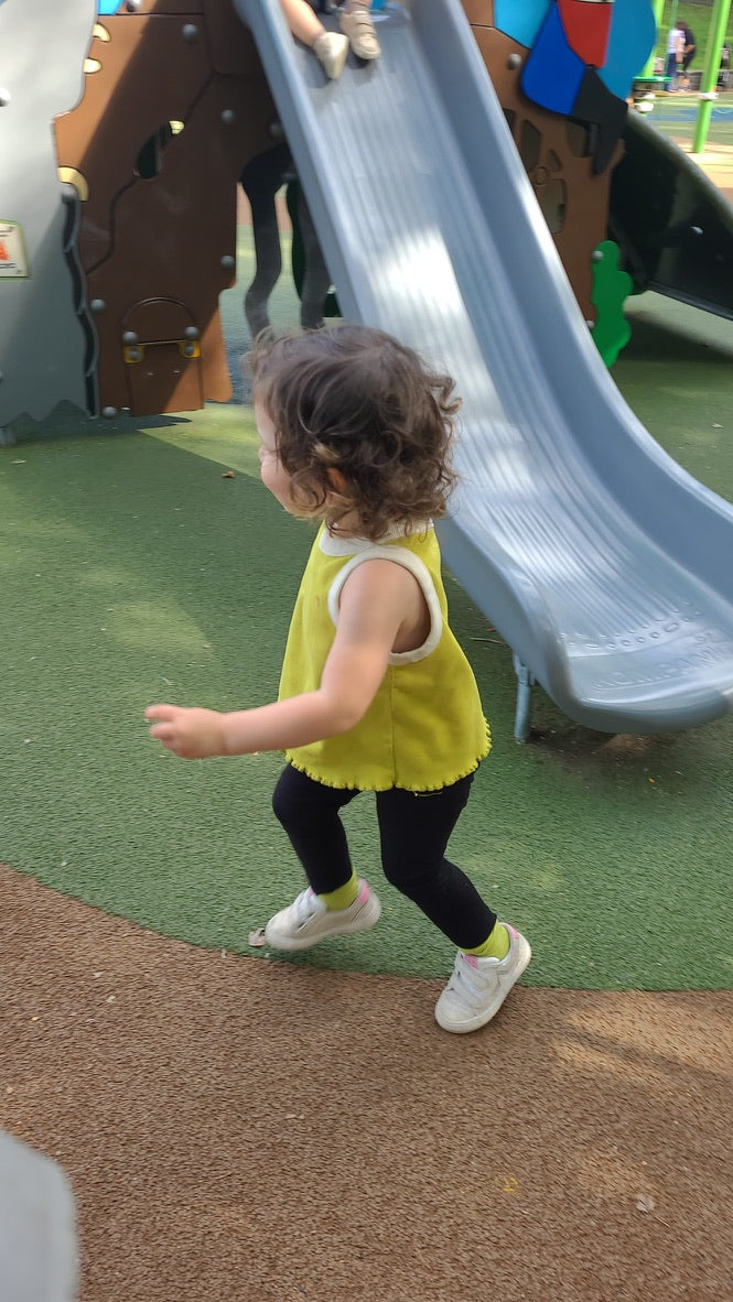Movement Creates Stronger Brain Connections for Learning- toddler running and moving in a playground